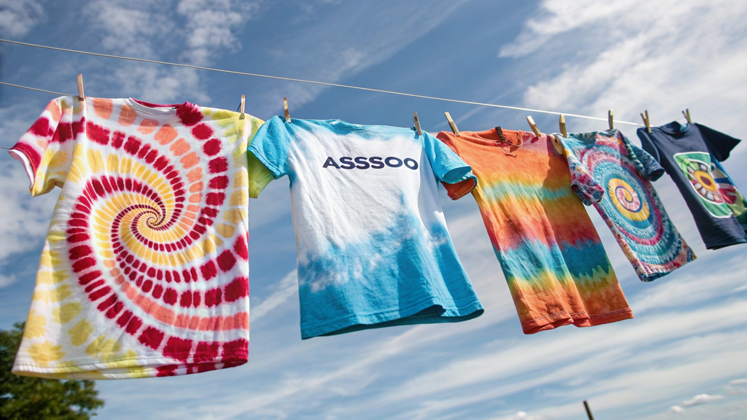 Colorful tie-dye t-shirt with spiral pattern on white background